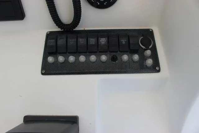 Slide: The Image of Control panel of 2017 Twin Vee OceanCat 260 TE. - 18