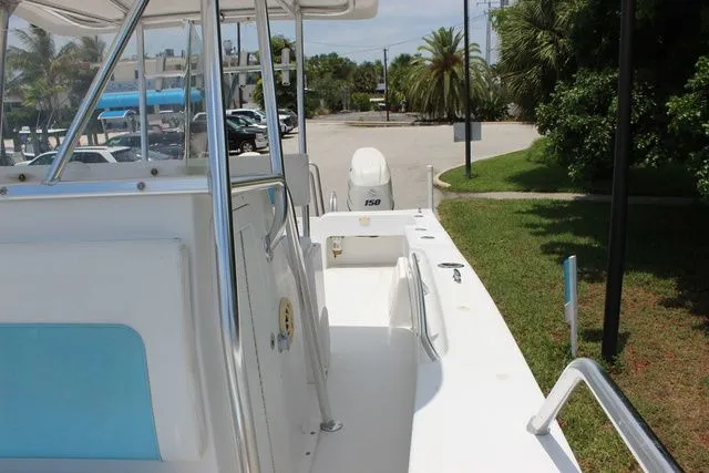 Slide: The Image of 2017 Twin Vee OceanCat 260 TE boat, side view, parked outdoors. - 25