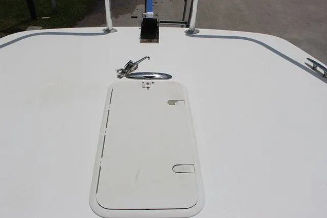 Slide: The Image of Deck view of 2017 Twin Vee OceanCat 260 TE with storage hatch. - 31
