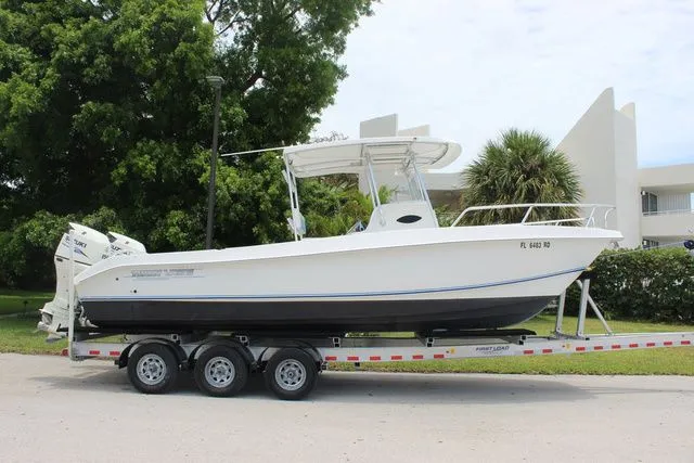 Slide: The Image of 2017 Twin Vee OceanCat 260 TE on trailer, side view. - 4