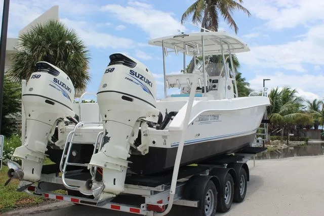 Slide: The Image of 2017 Twin Vee OceanCat 260 TE with Suzuki engines on trailer. - 6