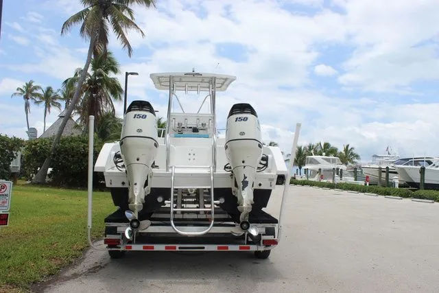 Slide: The Image of 2017 Twin Vee OceanCat 260 TE boat with dual outboard engines. - 7