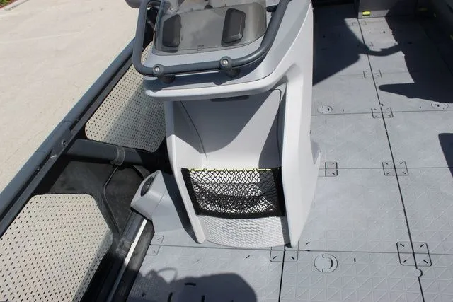 Slide: The Image of Interior of 2023 Sea-Doo Switch Cruise 21, featuring gray flooring. - 15