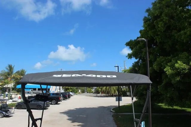 Slide: The Image of Sea-Doo Switch Cruise 21 canopy, 2023 model, with blue sky background. - 21