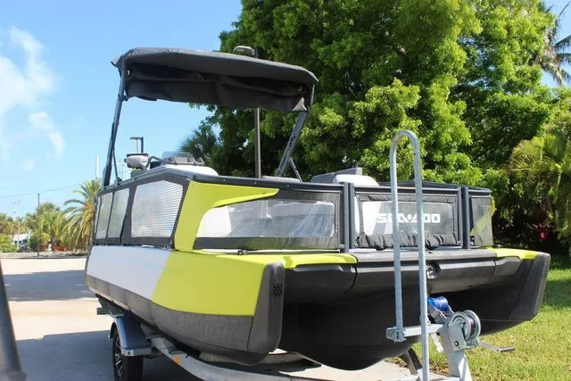 Slide: The Image of 2023 Sea-Doo Switch Cruise 21 on trailer, parked outdoors. - 3