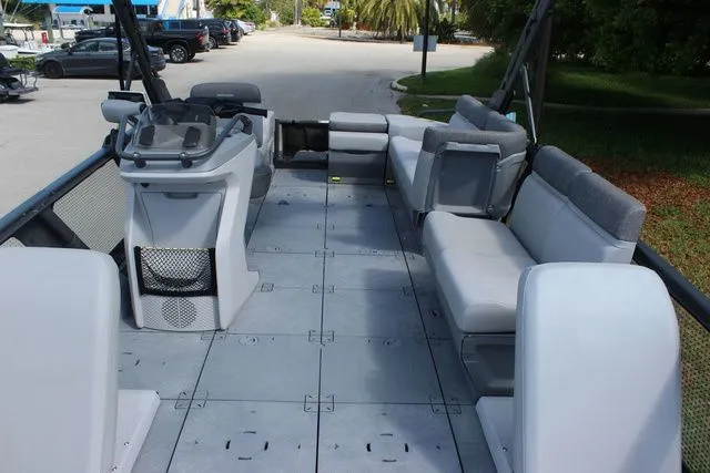 Slide: The Image of Interior of 2023 Sea-Doo Switch Cruise 21 with gray seating. - 7