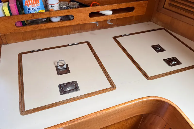 Slide: The Image of Wooden boat interior with storage compartments, Tanton 44, 1983 model. - 18