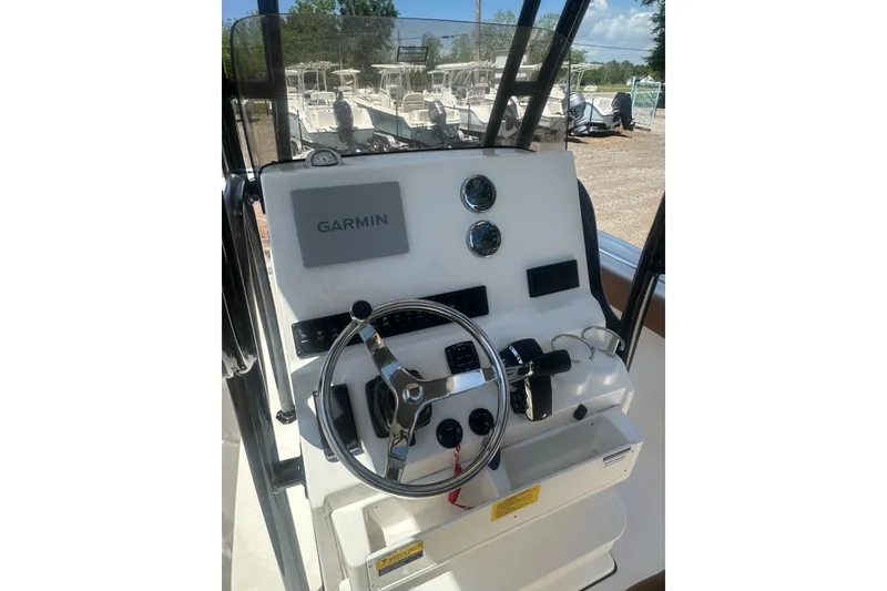 Slide: The Image of Helm of 2026 Key West 239 FS boat with Garmin navigation system. - 10