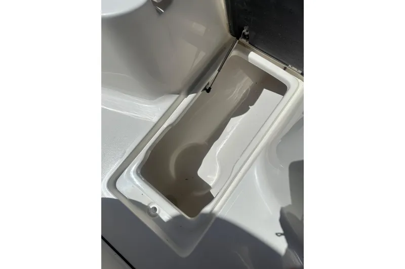 Slide: The Image of Open storage compartment on 2026 Key West 239 FS boat, showcasing interior space. - 35