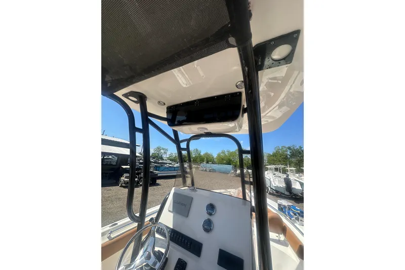 Slide: The Image of 2026 Key West 239 FS boat console with steering wheel and navigation equipment. - 44
