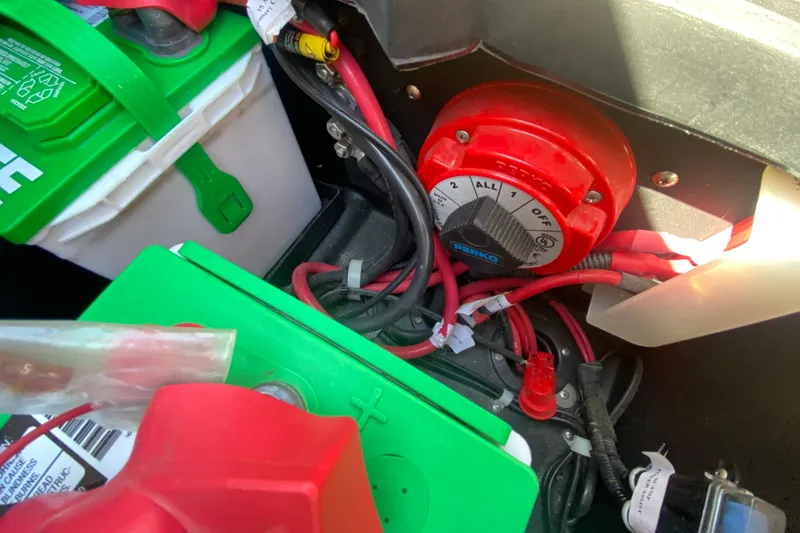 Slide: The Image of Captain's seat and helm of 2018 Harris Solstice 240 boat, dockside view. - 15