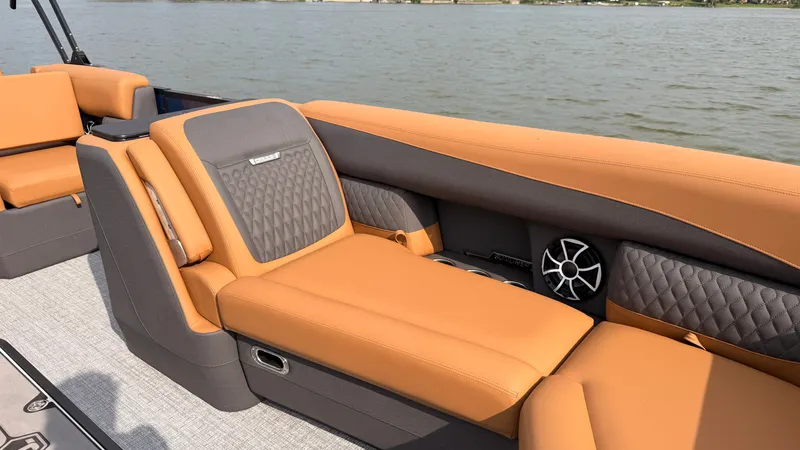 Slide: The Image of The image shows the luxurious interior of a 2027 Harris Sunliner 230 with comfortable seating. - 16