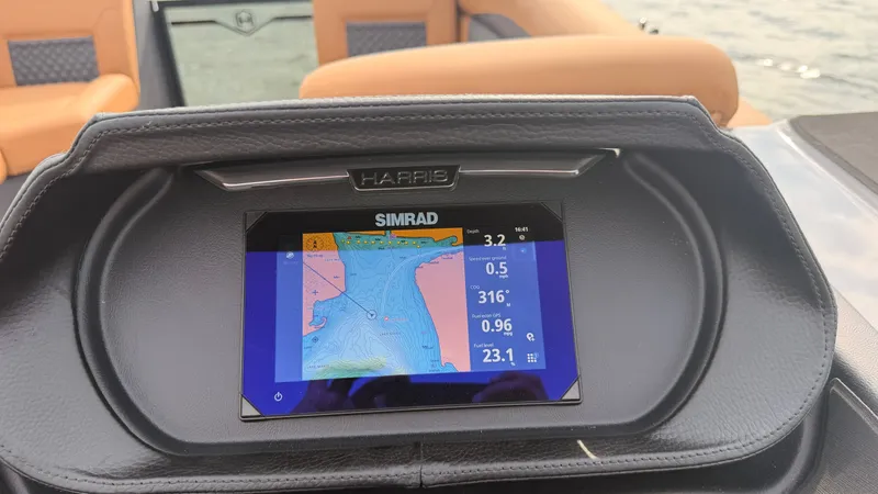Slide: The Image of Simrad navigation system on a Harris Sunliner 230 pontoon boat. - 34