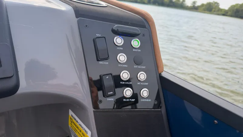 Slide: The Image of The image shows the control panel of a Harris Sunliner 230 with various controls. - 35