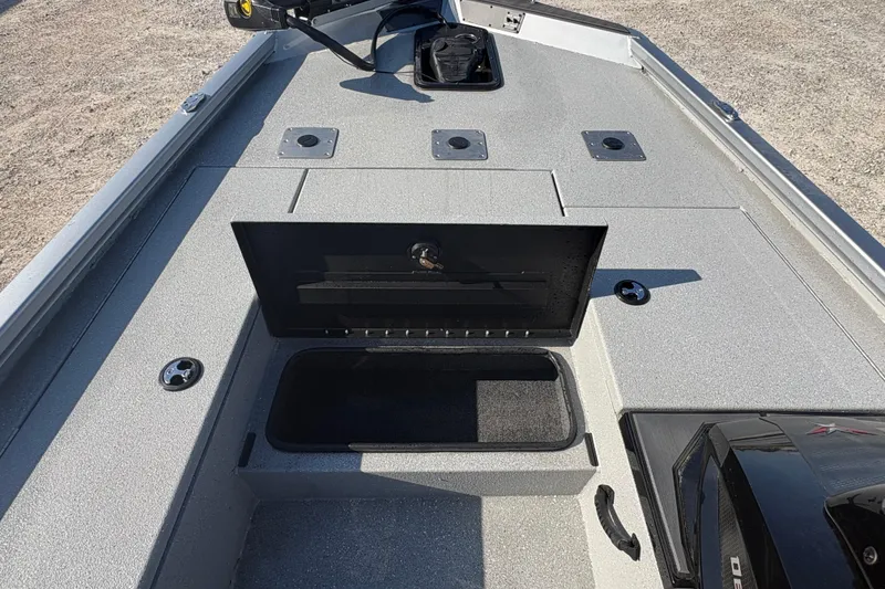 Slide: The Image of 2026 Vexus AVX181 boat deck with open storage compartment and mounted equipment. - 12