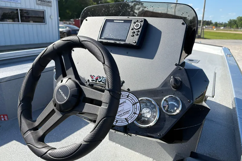 Slide: The Image of Steering console of 2026 Vexus AVX181 boat with gauges and navigation display. - 9