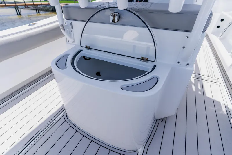 Slide: The Image of Open storage compartment on a 1998 World Cat 266 SF boat deck. - 45