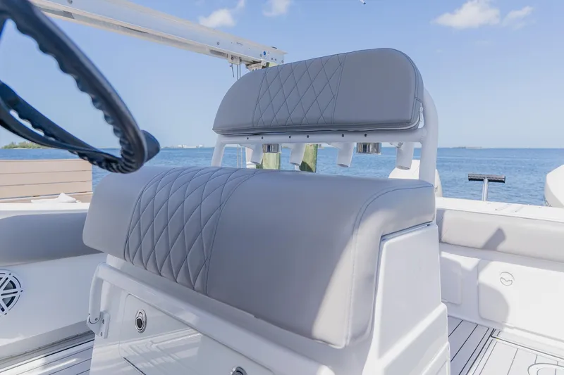Slide: The Image of Luxury seating on a 1998 World Cat 266 SF boat with ocean view. - 53