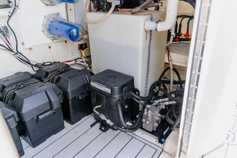 Slide: The Image of Electrical and mechanical components inside a 1998 World Cat 266 SF boat. - 70