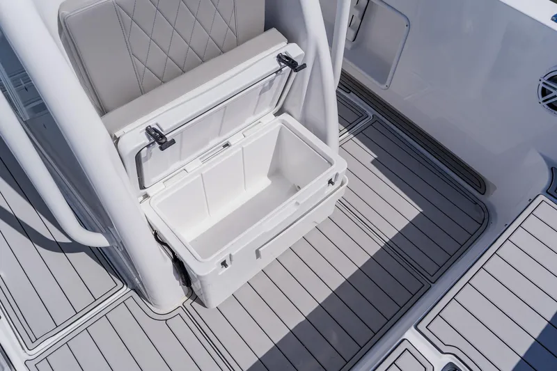 Slide: The Image of Open storage compartment on 1998 World Cat 266 SF boat deck. - 79