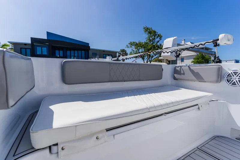 Slide: The Image of 1998 World Cat 266 SF boat interior with cushioned seating and modern design. - 84