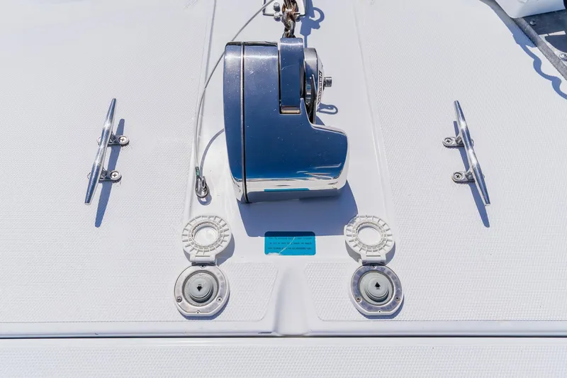 Slide: The Image of Close-up of a 1998 World Cat 266 SF boat deck with cleats and winch. - 95