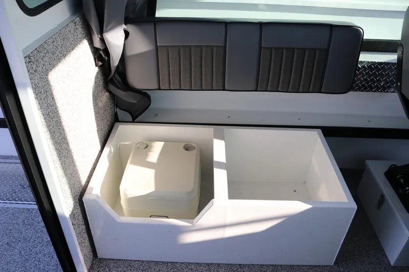 Slide: The Image of Interior of 2026 Alumaweld Horizon 26 boat with seating and storage compartments. - 11