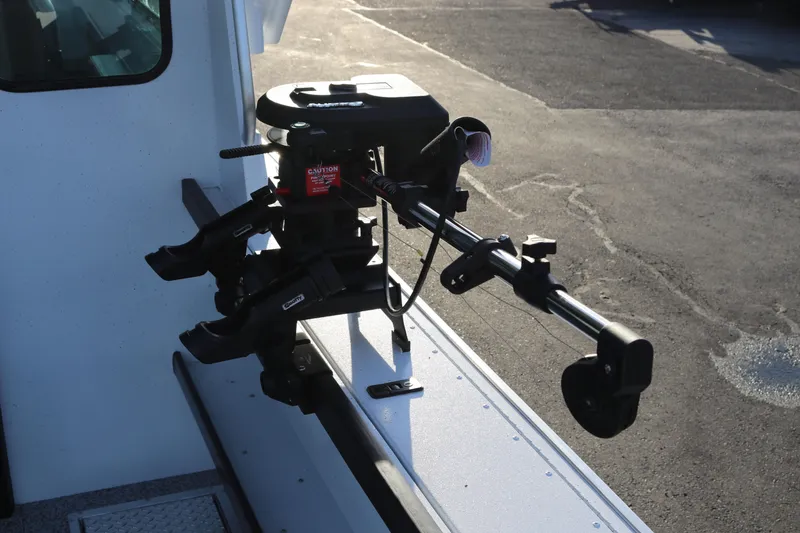Slide: The Image of Fishing rod holder on 2026 Alumaweld Horizon 26 boat, mounted on deck. - 17
