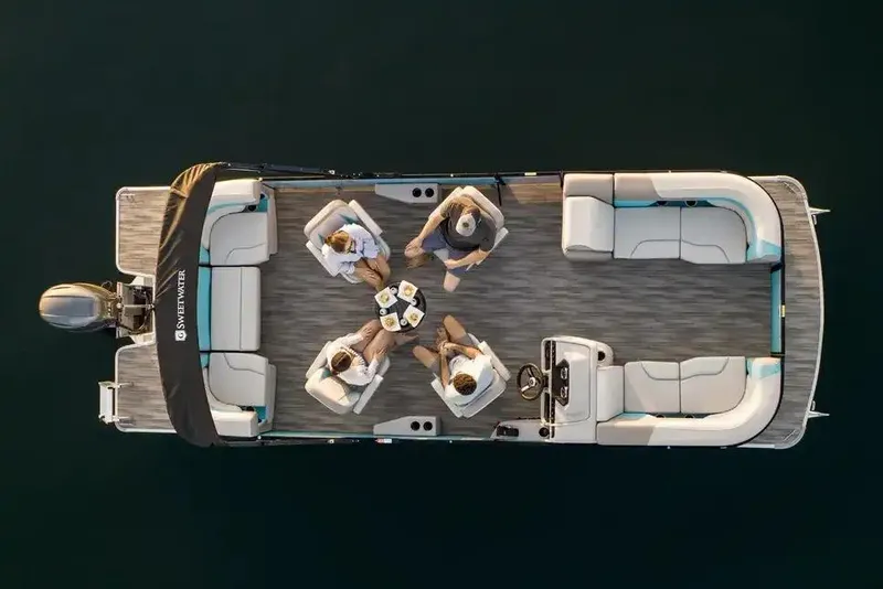 Slide: The Image of Manufacturer Provided Image: Manufacturer Provided Image: 2026 Godfrey Sweetwater Cruise pontoon boat with people relaxing on deck, aerial view. - 4