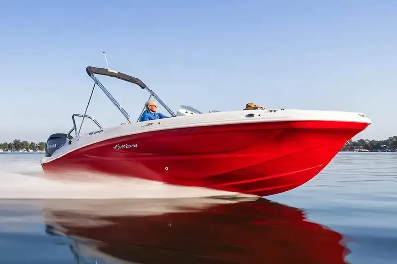 Slide: The Image of 2026 Hurricane SunDeck Sport 2050 OB boat, red and white design, sleek and modern. - 2