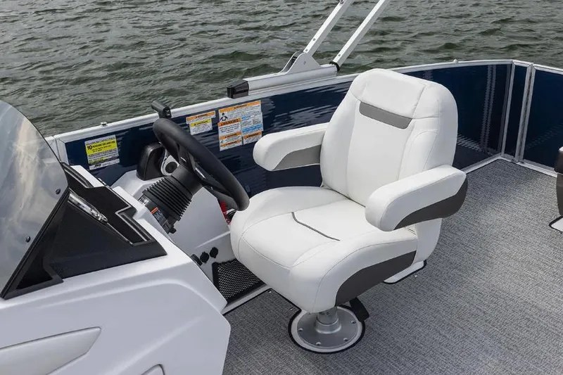 Slide: The Image of Manufacturer Provided Image: Captain's chair on 2026 Hurricane FunDeck 2260 RE OB boat, overlooking water. - 4