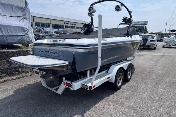 The Image of 2009 Centurion Avalanche C4 boat on trailer at dealership, rear view. - 0