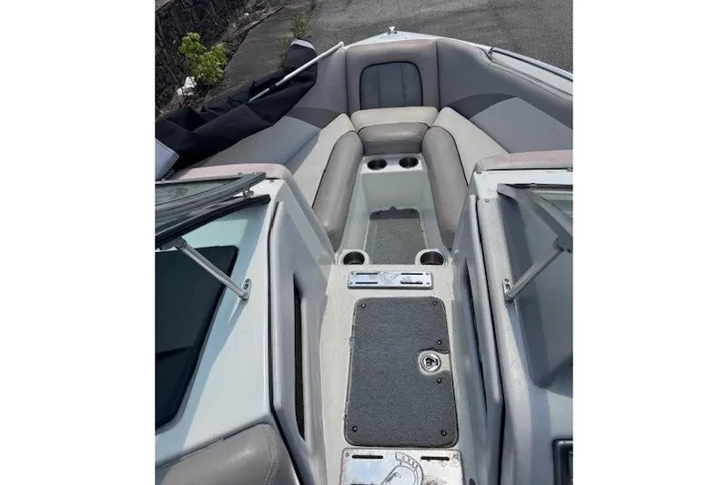 Slide: The Image of 2009 Centurion Avalanche C4 boat interior with gray seating and cup holders. - 10