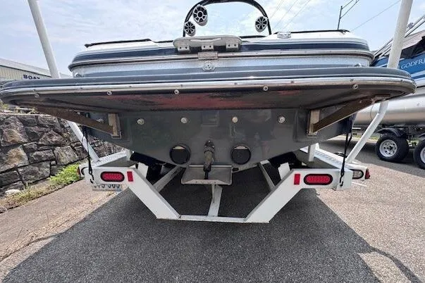 Slide: The Image of Rear view of a 2009 Centurion Avalanche C4 boat on a trailer. - 2
