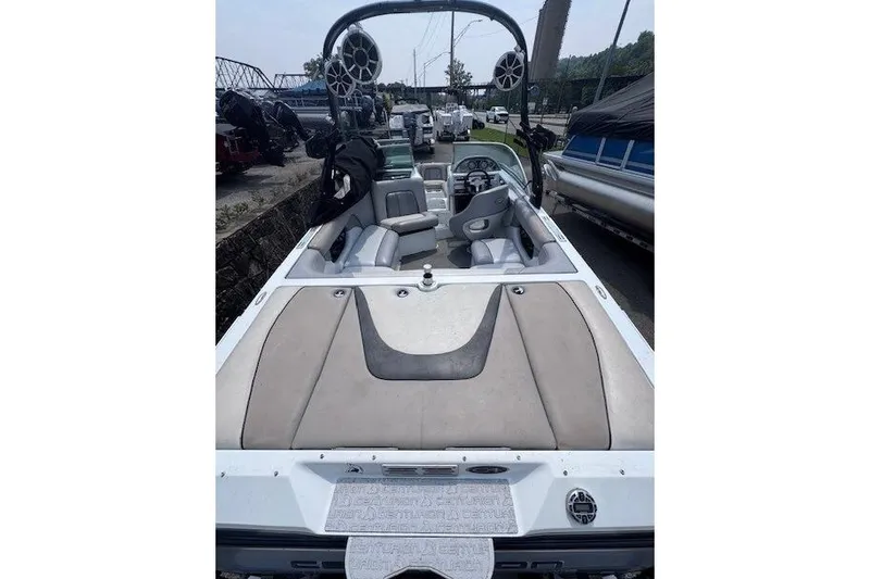 Slide: The Image of 2009 Centurion Avalanche C4 boat interior with seating and audio system. - 3