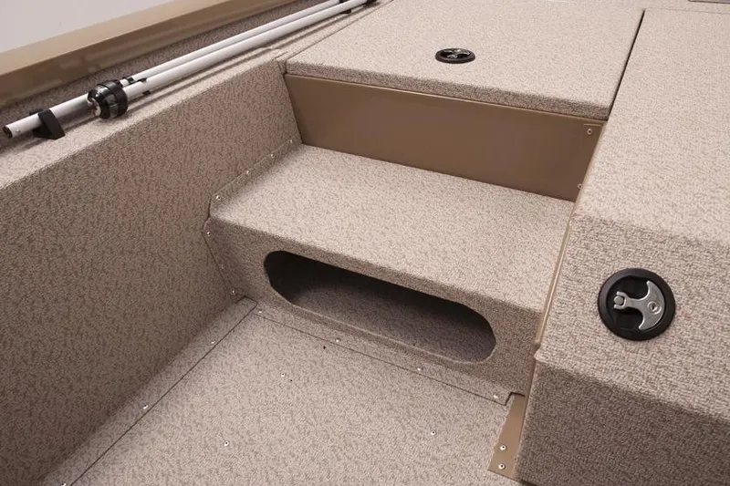 Slide: The Image of Manufacturer Provided Image: 2022 G3 Sportsman 1710 boat interior with rod storage and carpeted steps. - 12