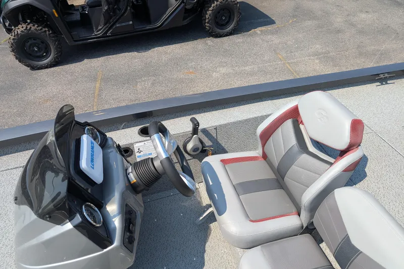 Slide: The Image of 2022 G3 Sportsman 1710 boat interior with steering wheel and seats, featuring a Lorance device. - 4