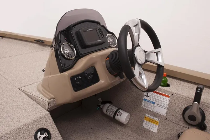 Slide: The Image of Manufacturer Provided Image: 2022 G3 Sportsman 1710 boat console with steering wheel and control panel. - 9