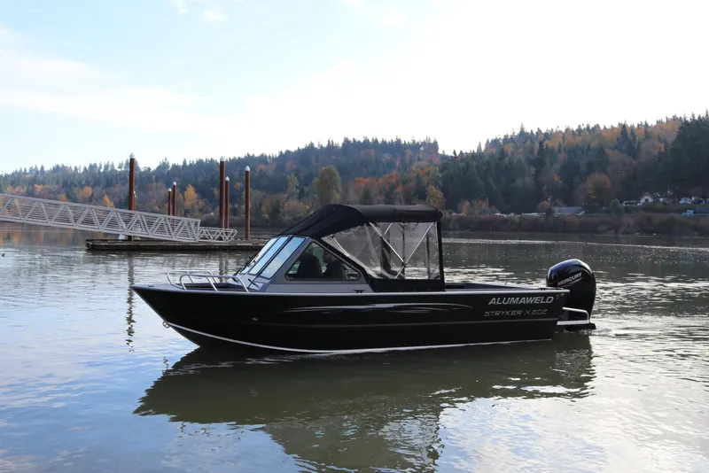The Image of 2026 Alumaweld Stryker X202 boat on a calm lake. - 0