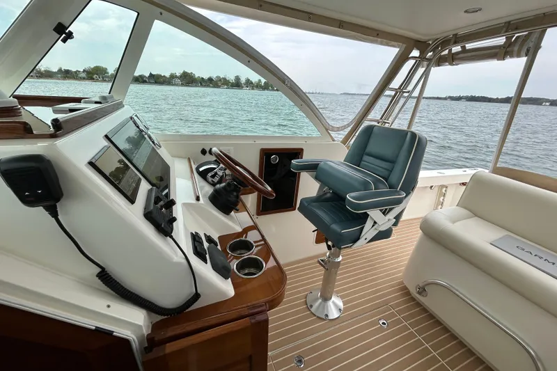 Slide: The Image of Interior view from a 2020 Hunt Yachts Surfhunter 32, overlooking calm waters. - 17