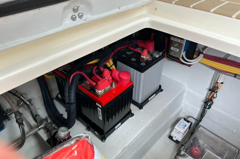 Slide: The Image of Helm of 2020 Hunt Yachts Surfhunter 32 with luxurious seating and navigation controls. - 19