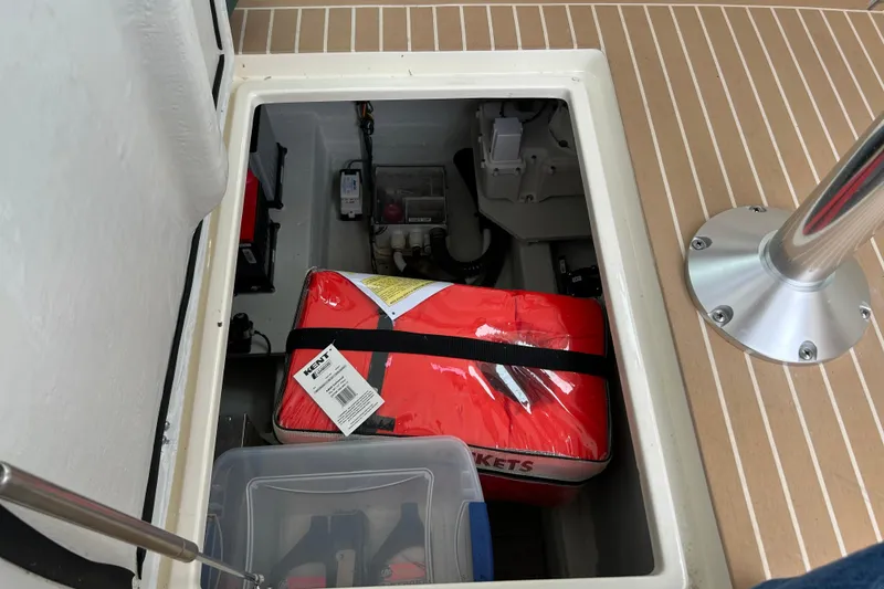 Slide: The Image of 2020 Hunt Yachts Surfhunter 32 interior with comfortable seating and scenic water view. - 20