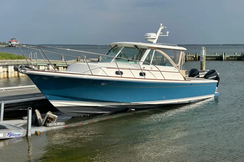 Slide: The Image of 2020 Hunt Yachts Surfhunter 32 cruising on calm waters. - 3