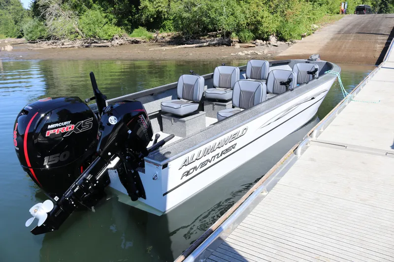 Slide: The Image of 2026 Alumaweld Adventurer 20 boat docked with Mercury Pro XS engine. - 8