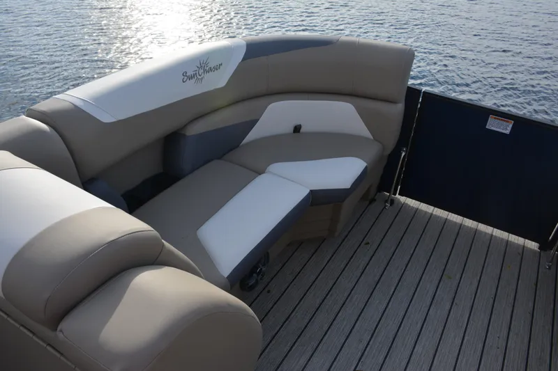 Slide: The Image of Luxurious seating on 2026 SunChaser Eclipse 25 LR DH pontoon boat, overlooking serene water. - 6