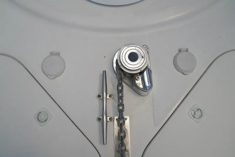 Slide: The Image of Anchor chain and cleat on 1999 Carver 450 Voyager Pilothouse deck. - 11