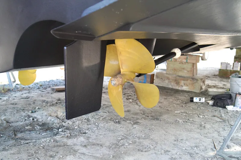 Slide: The Image of Propeller and rudder of 1999 Carver 450 Voyager Pilothouse on dry dock. - 17