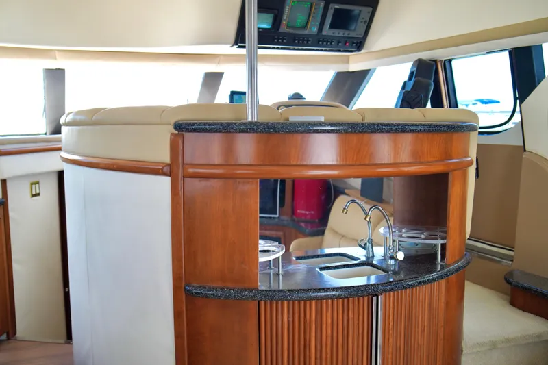 Slide: The Image of Luxurious interior of 1999 Carver 450 Voyager Pilothouse yacht with modern amenities. - 36
