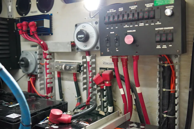 Slide: The Image of Electrical panel and wiring inside a 1999 Carver 450 Voyager Pilothouse boat. - 61