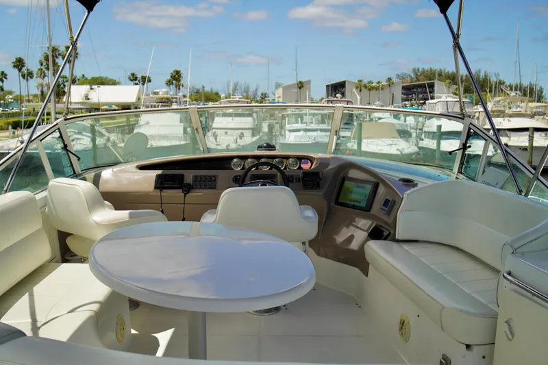 Slide: The Image of Interior view of 1999 Carver 450 Voyager Pilothouse yacht with helm and seating area. - 66